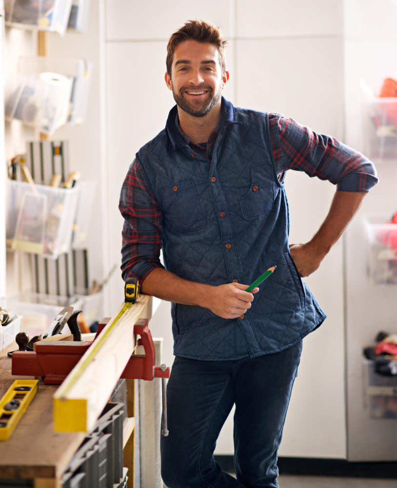 Carpenter in his shop representing client served